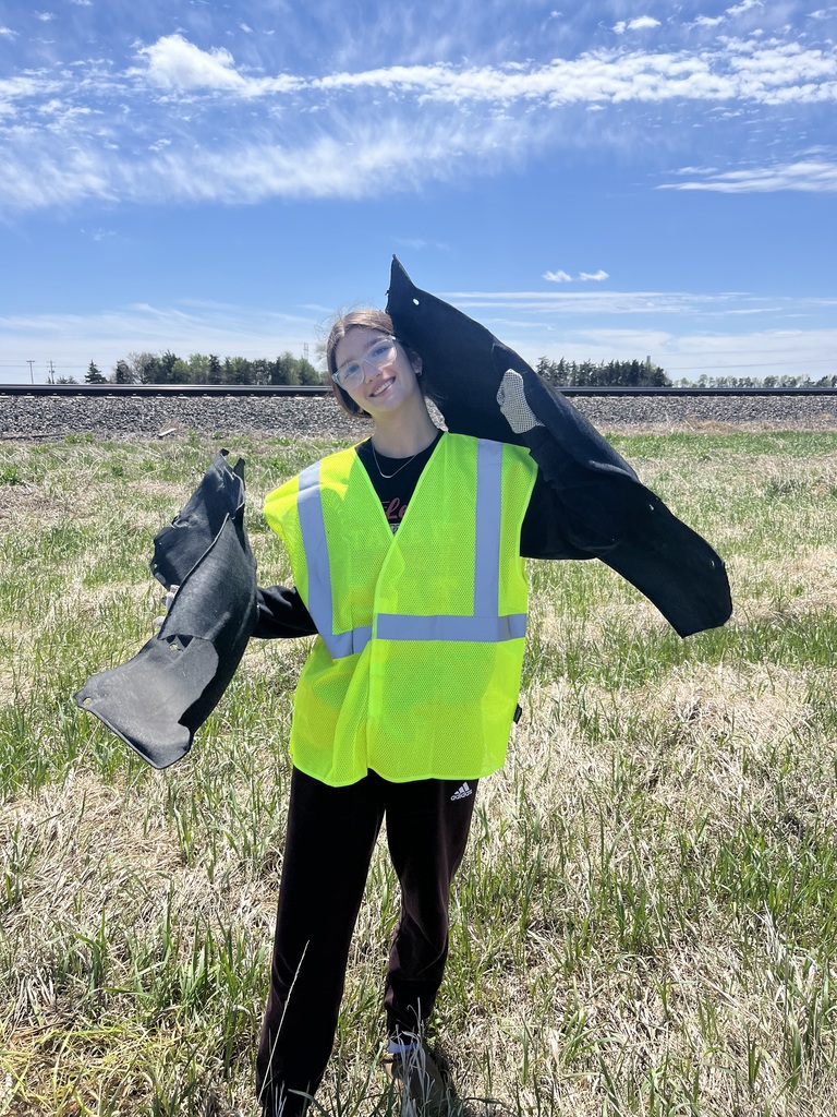 Student picking up trash
