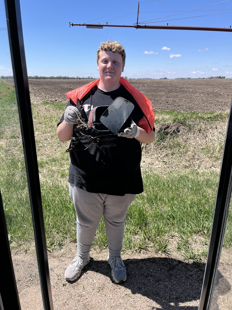 Student picking up trash
