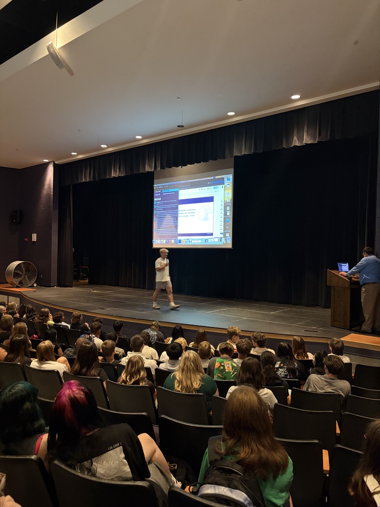 Briggs presenting to students