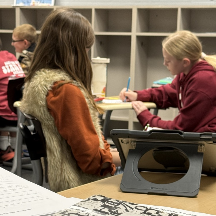 students working on complex sentence structure 