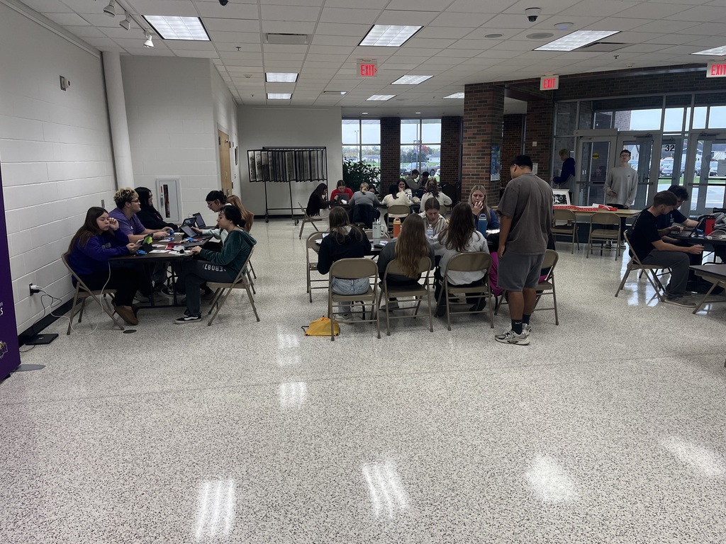 Seniors working on applications and scholarships