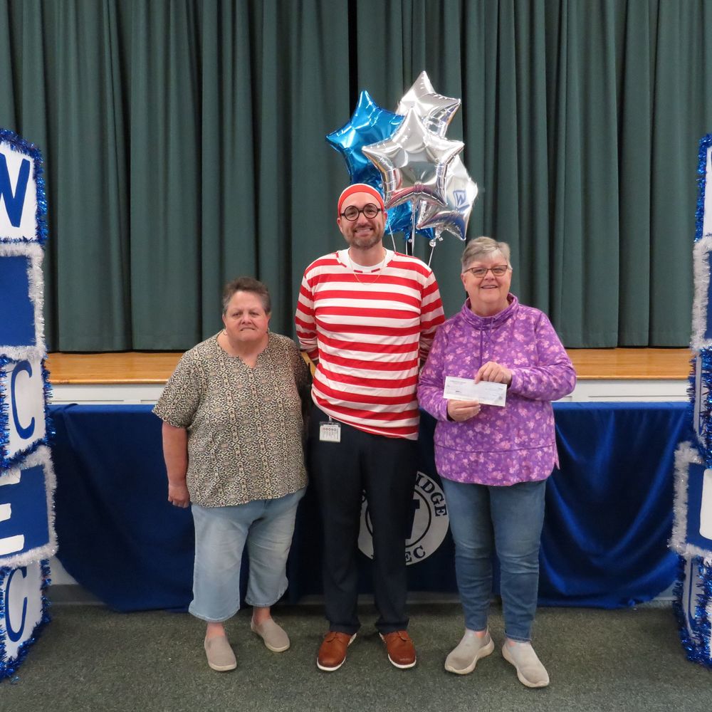 Donation Check being presented