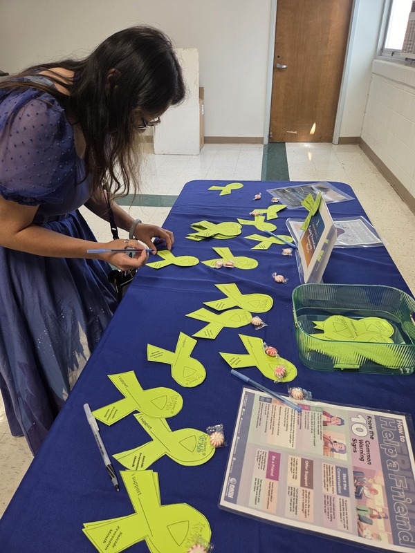Staff filling out ribbon