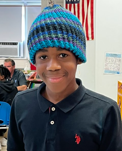 student wearing hat