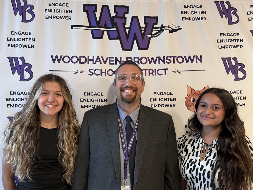 two students with supt matt salah