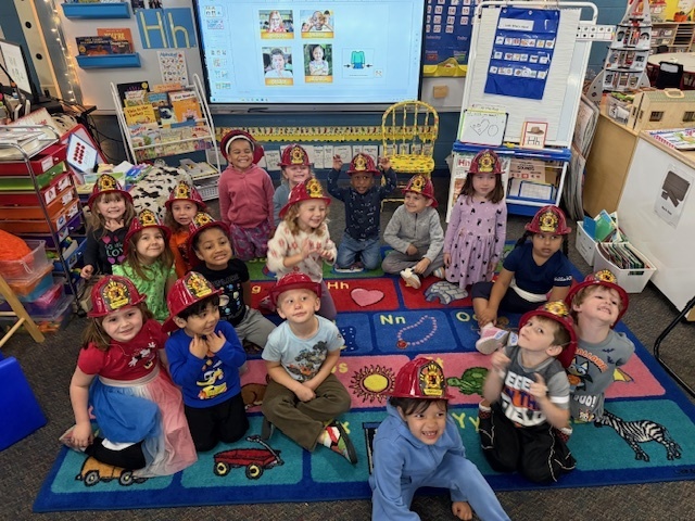 students in firehats