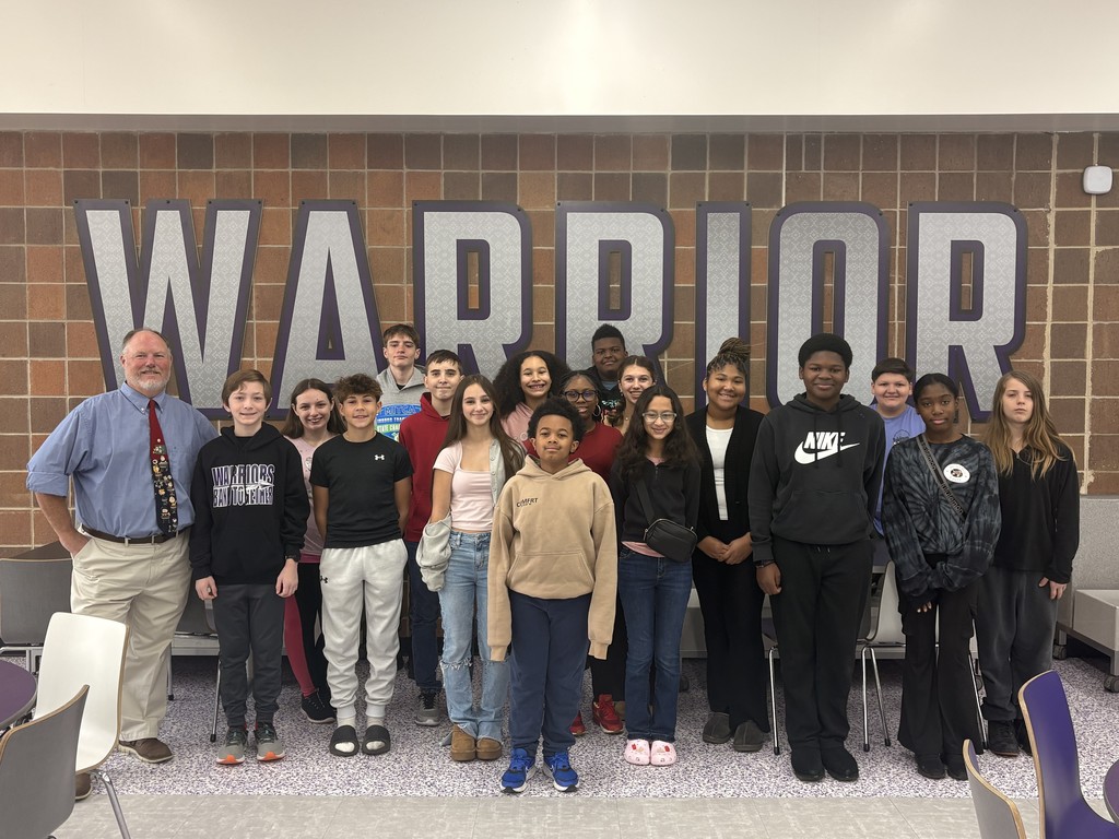 principal andrew clark with students