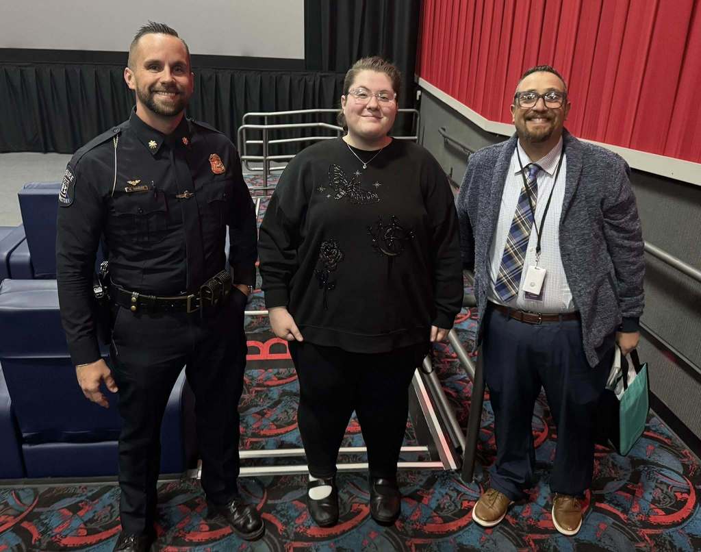 deputy police chief with a teacher and director of special education