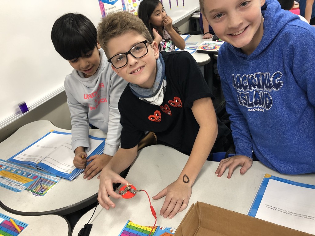 students testing closed circuits