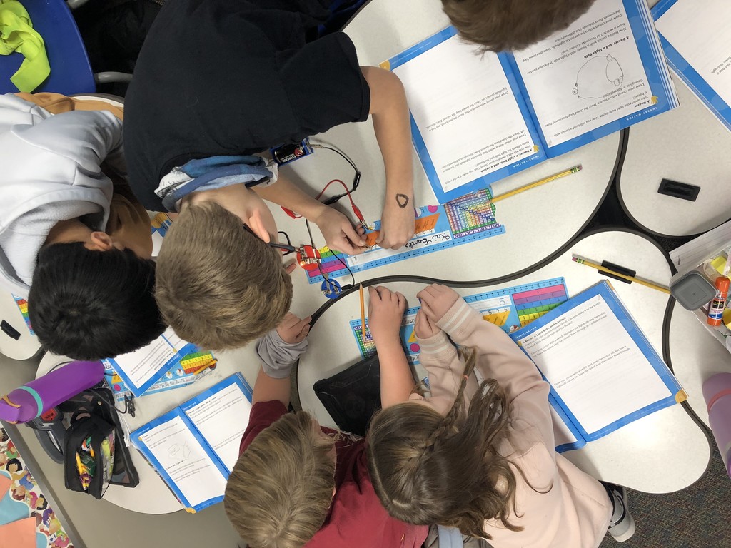 students testing closed circuits