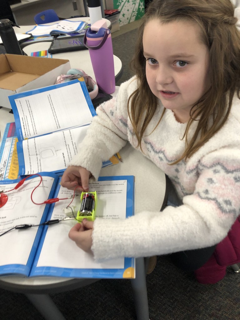 students testing closed circuits