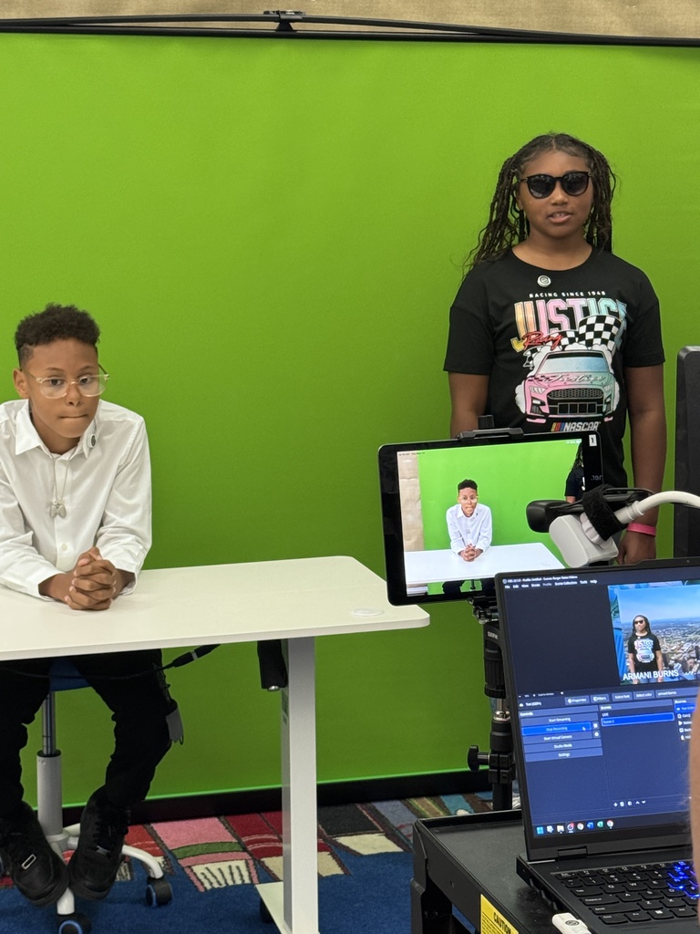 students get ready to record their travel show
