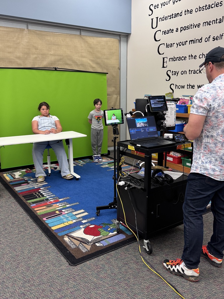 students get ready to record their travel show