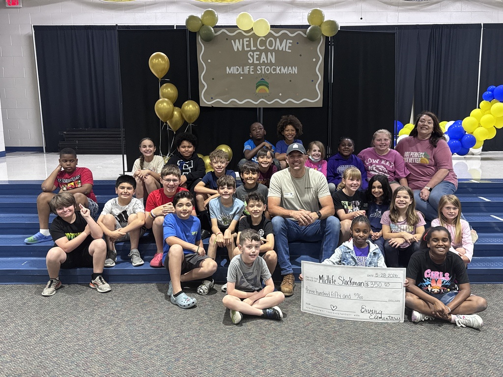 students present sean midlife stockman with a check for his free yard services