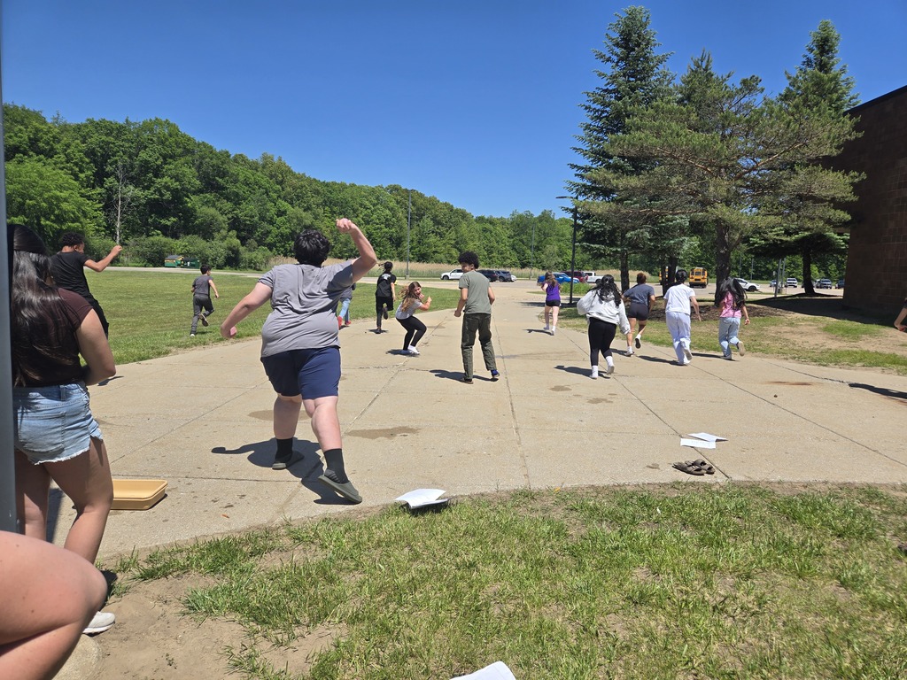 students science experiment with balloons outside BMS