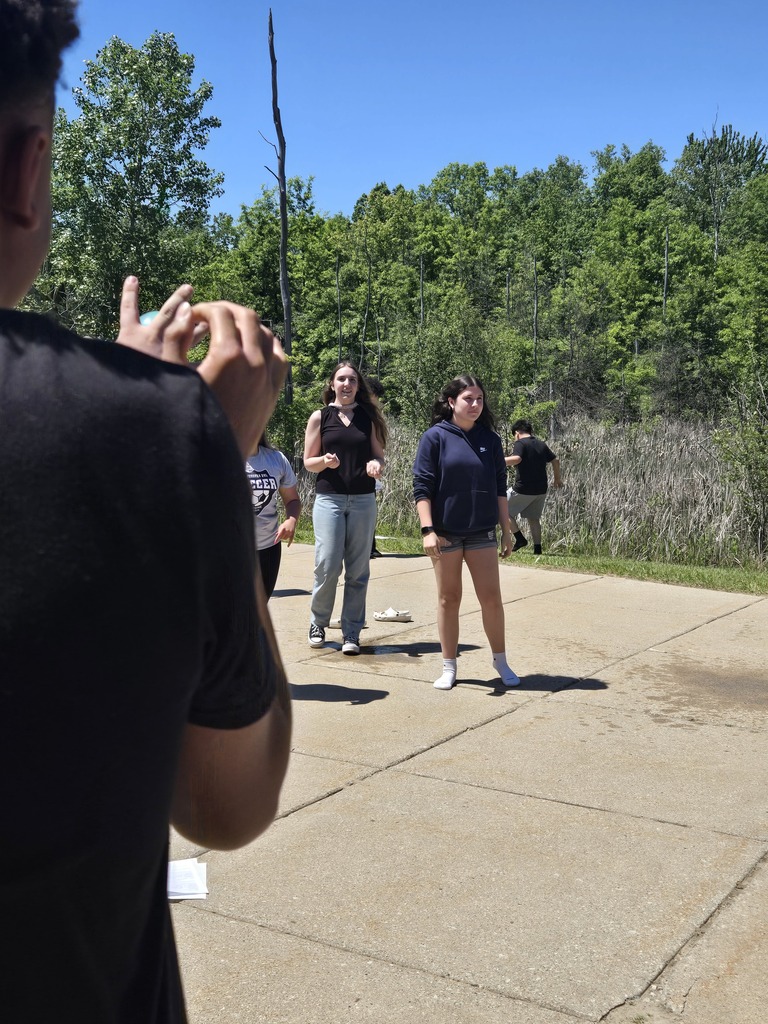 students science experiment with balloons outside BMS