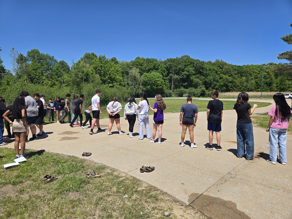 students science experiment with balloons outside BMS
