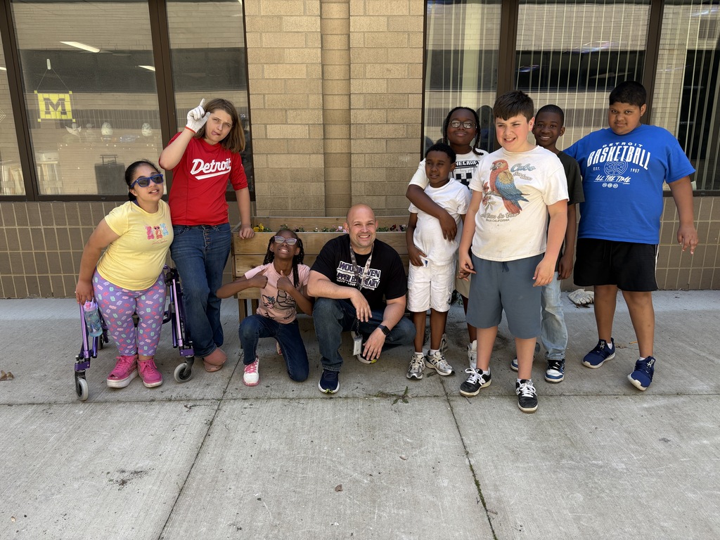 wbsd students cleaned and planted flowerbeds