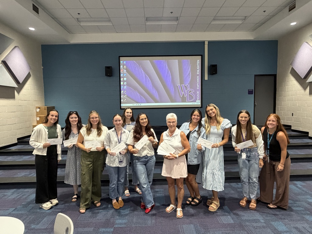 new teachers with checks from wbef grants