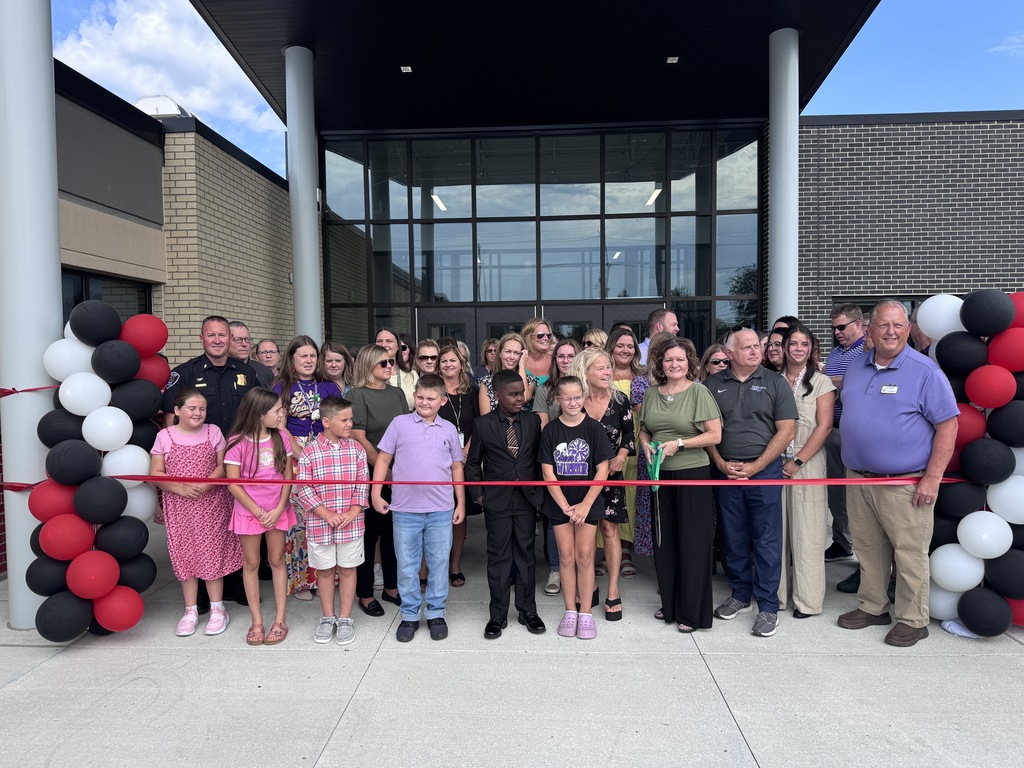 bates ribbon cutting