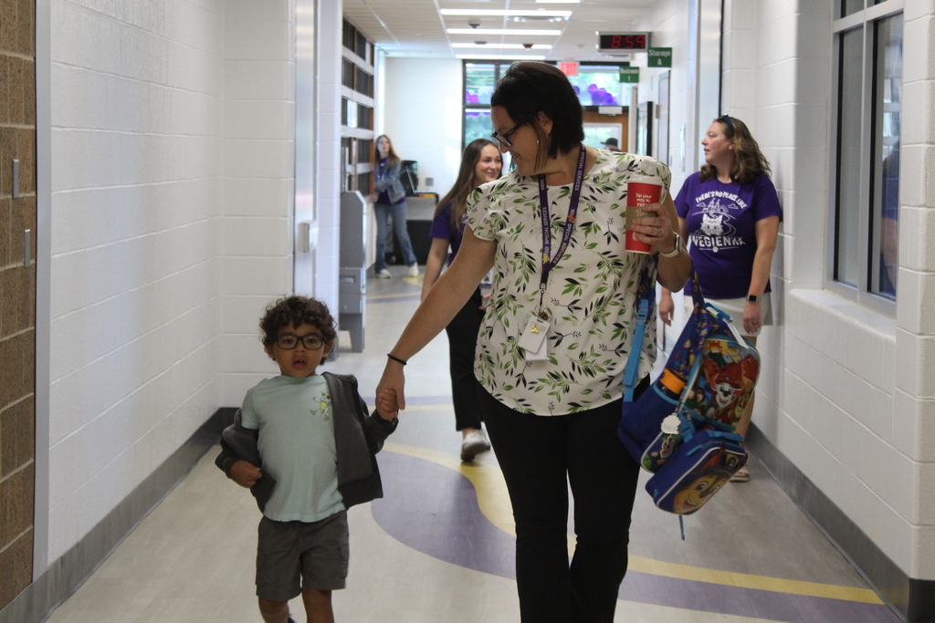 teacher and student in hallway