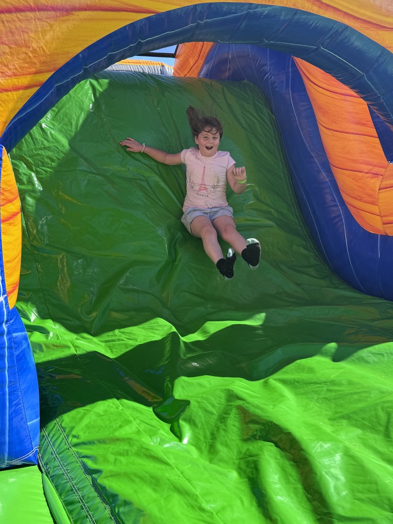 student in bounce house