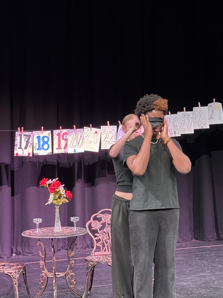students in play acting 