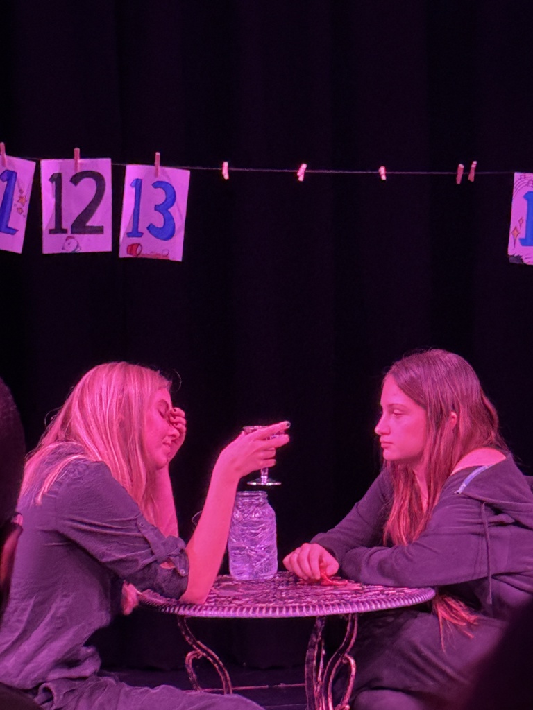 students in play acting 