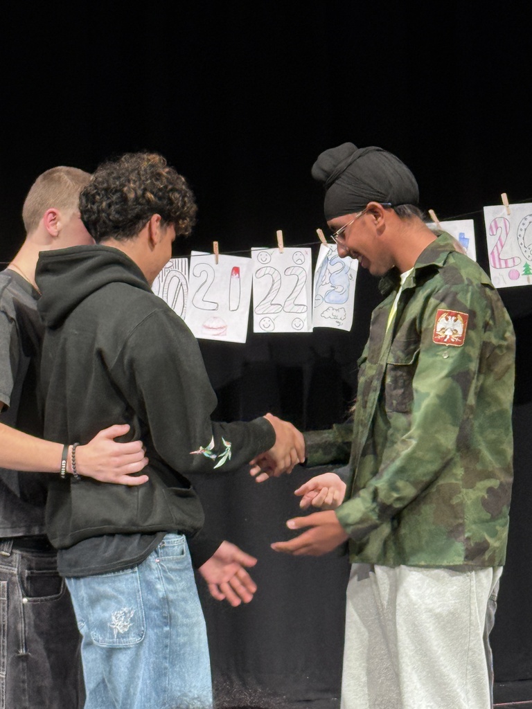students in play acting 