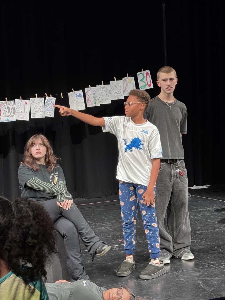 students in play acting 
