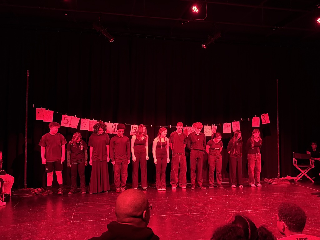 students in play acting 