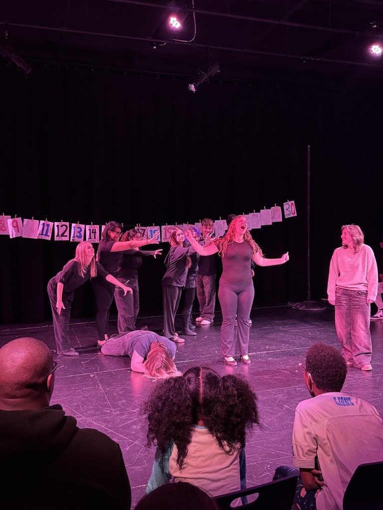 students in play acting 