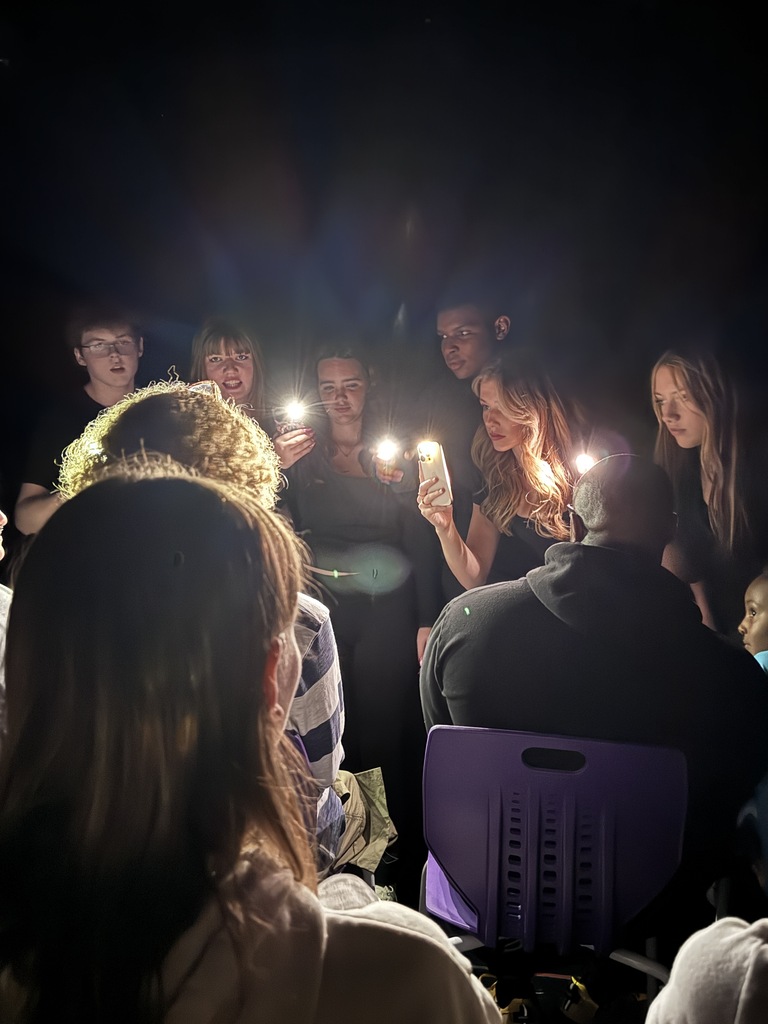 students in play acting 