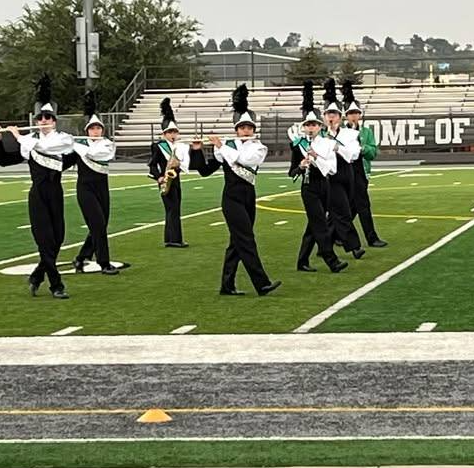 Marching band performing at the Harrison clinic