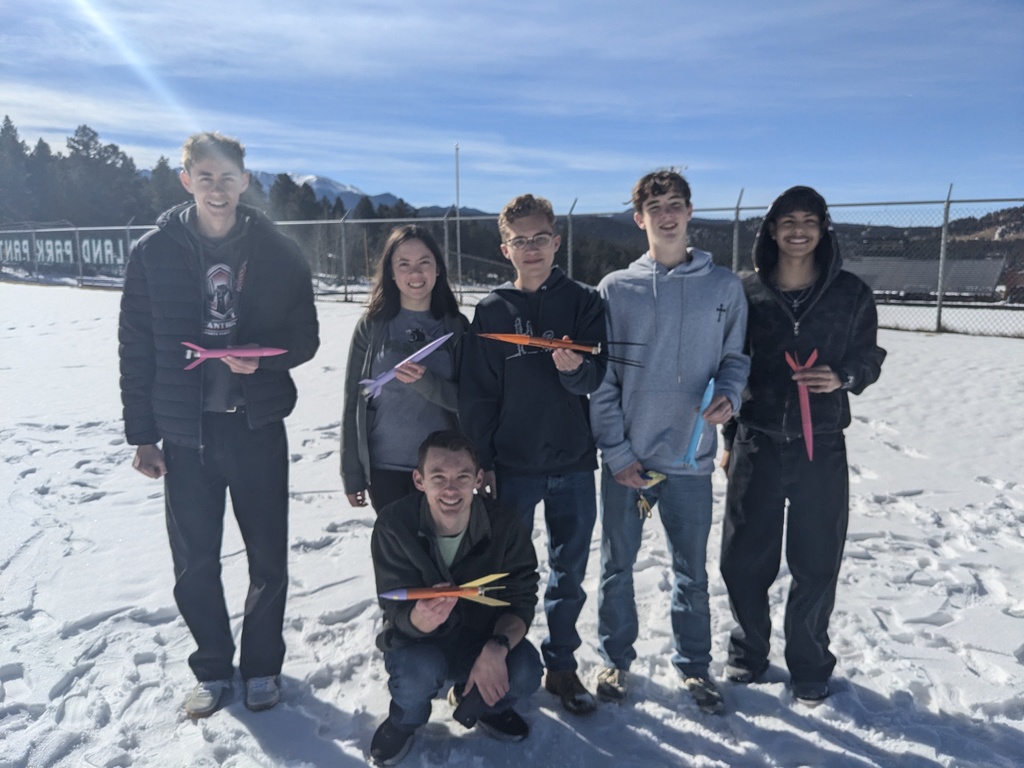 Aerospace Engineering students with their model rockets