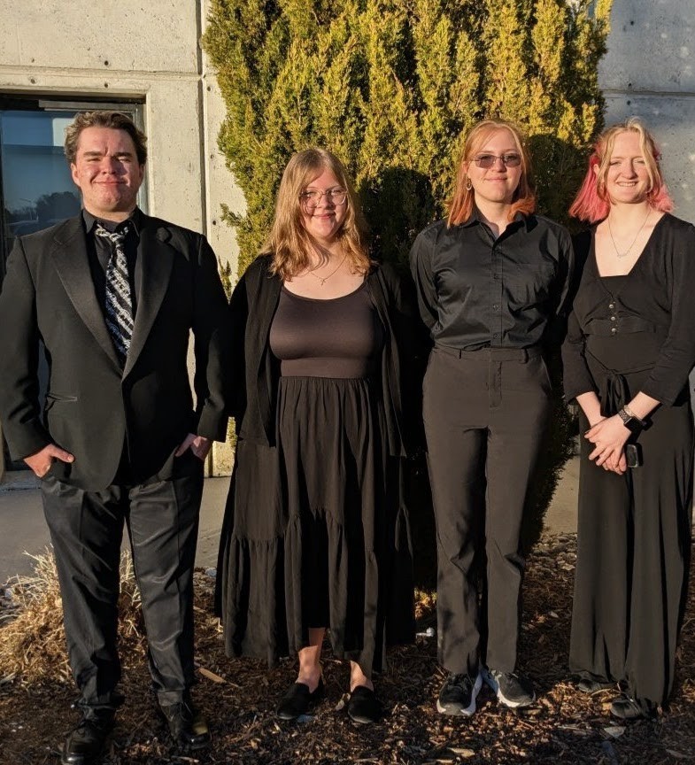 Photo of band students Layne Hoffstetter, Evie Rohman, Sarah Walma, and Alexis Bateman