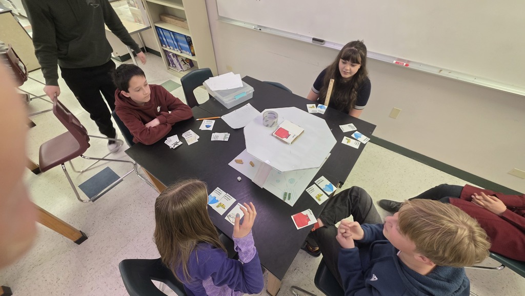 STEAM students playing one of the student-made games
