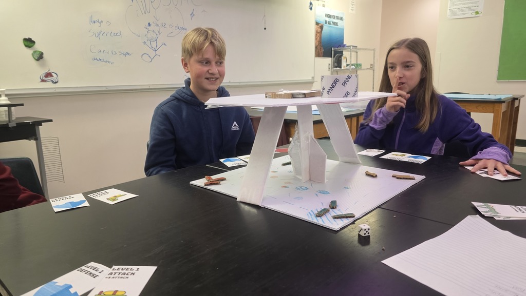 STEAM students playing one of the student-made games