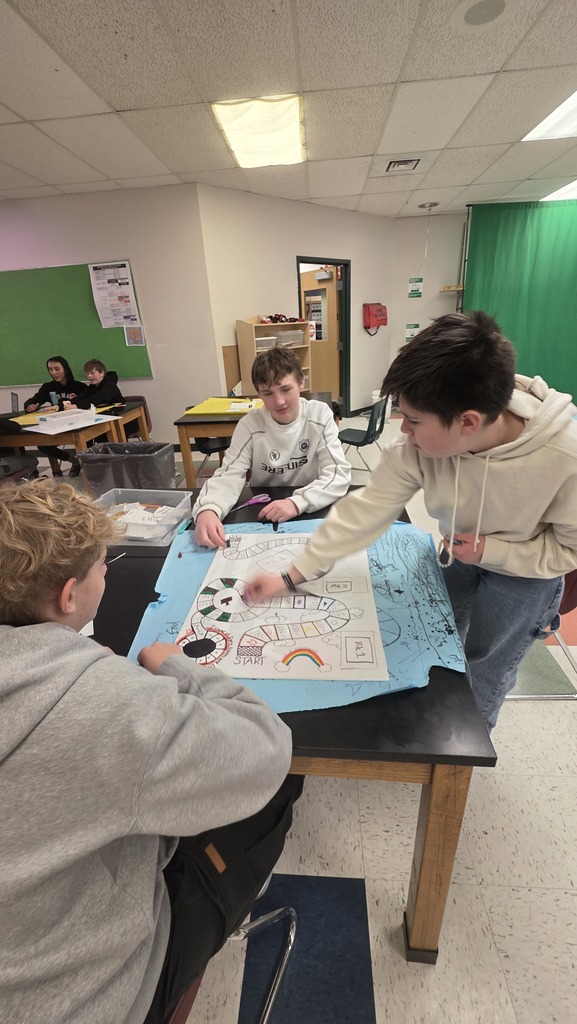 STEAM students playing one of the student-made games