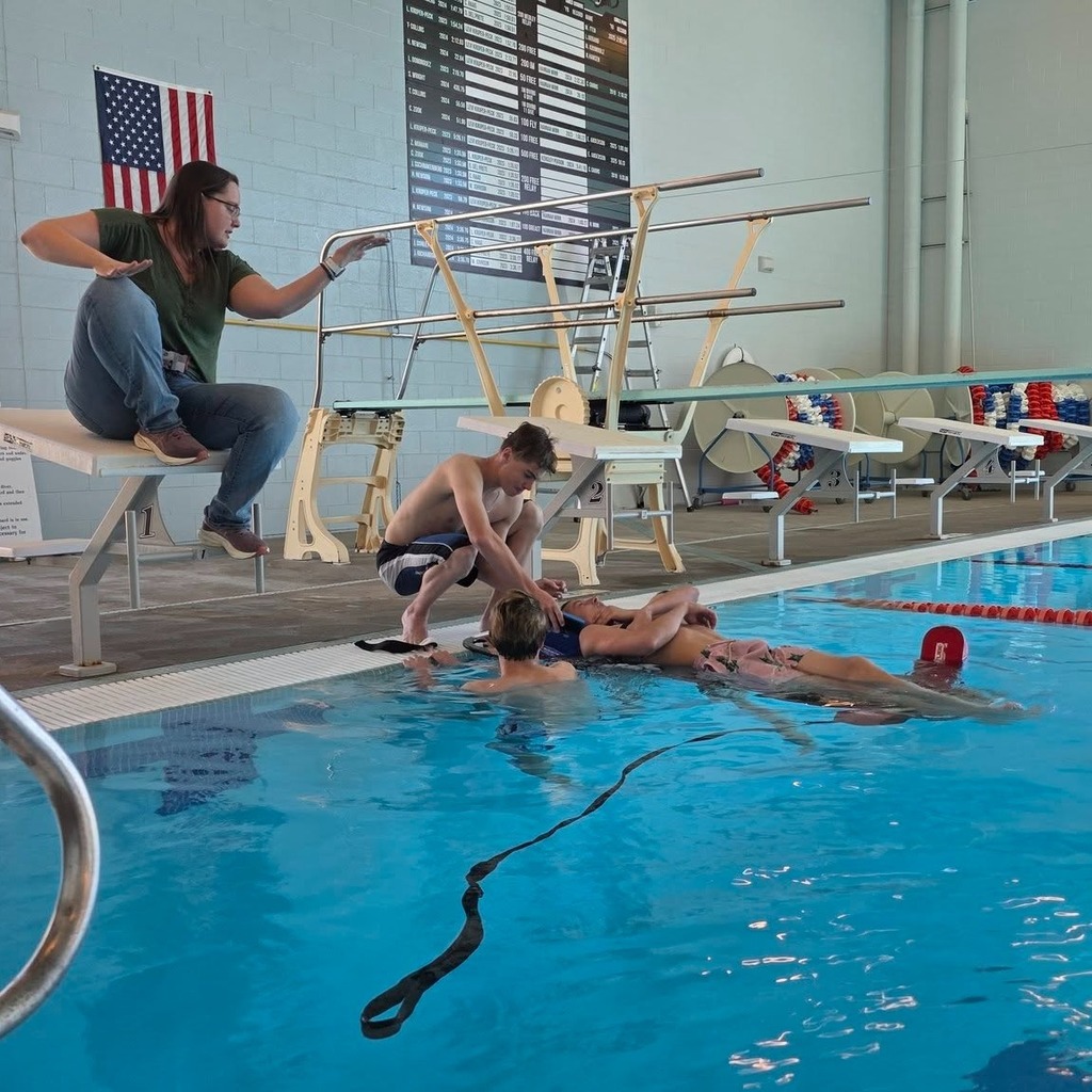 Students in the Lifeguard class practicing skills