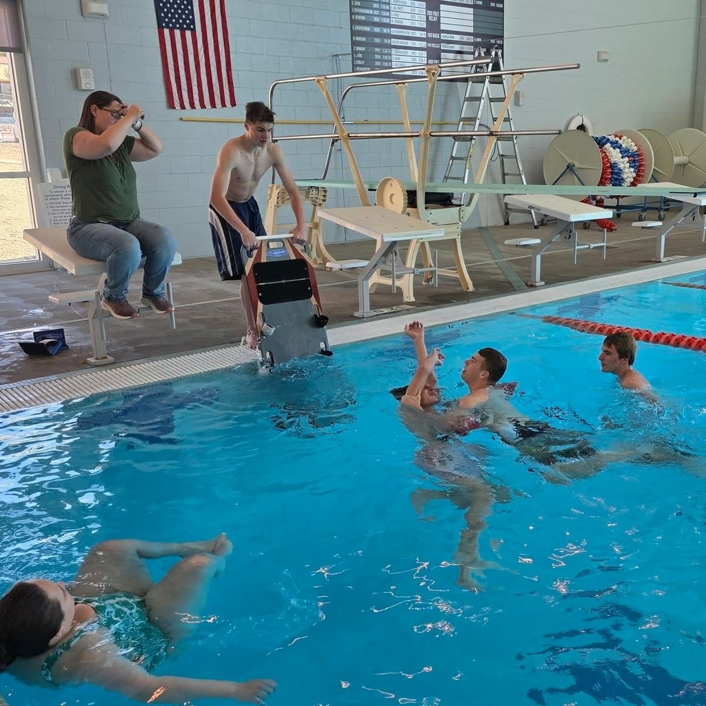 Students in the Lifeguard class practicing skills