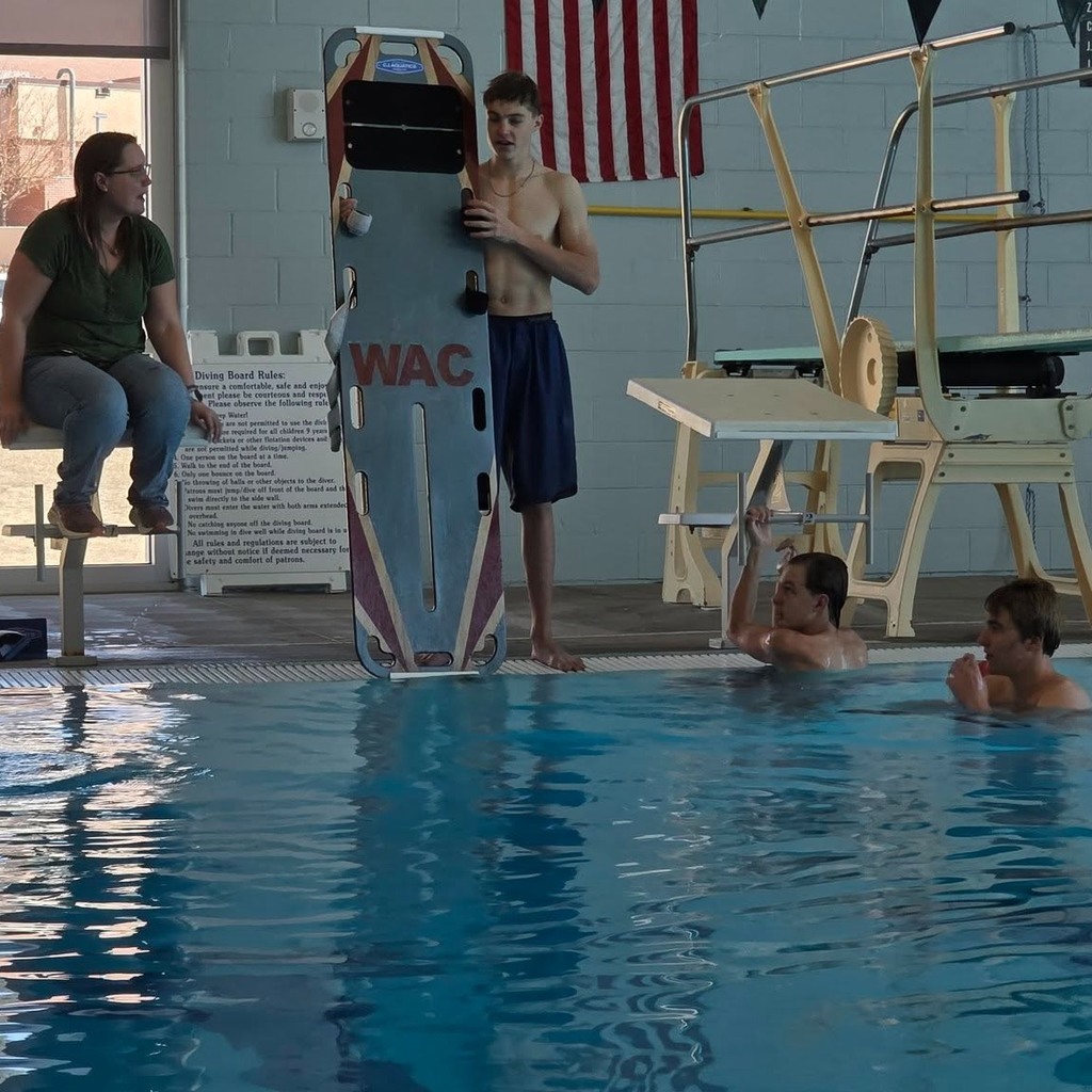 Students in the Lifeguard class practicing skills