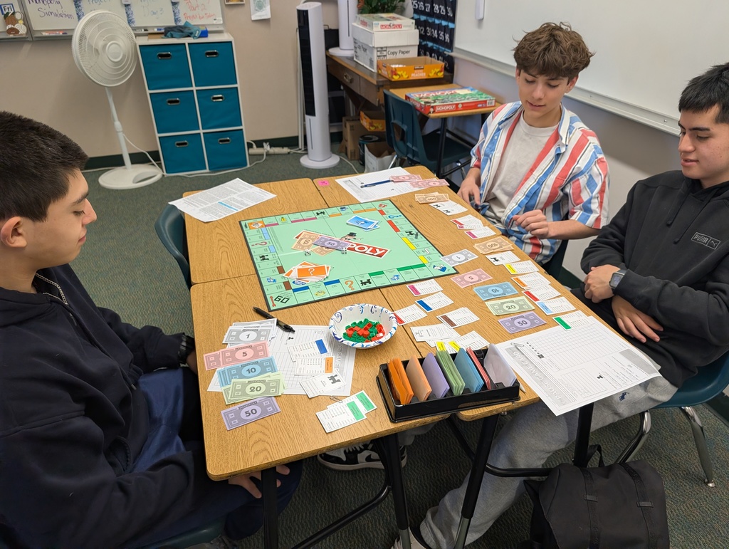 Students in Mrs. Schumacher's Personal Finance class playing Monopoly