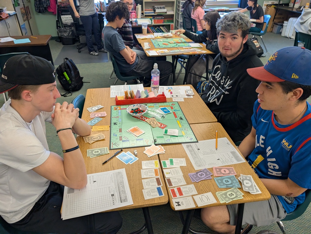 Students in Mrs. Schumacher's Personal Finance class playing Monopoly