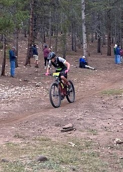 Mountain Bike team racer on course