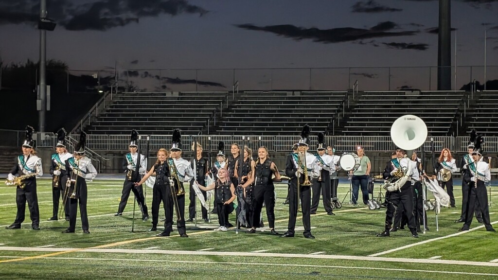 The marching on the field ready to perform
