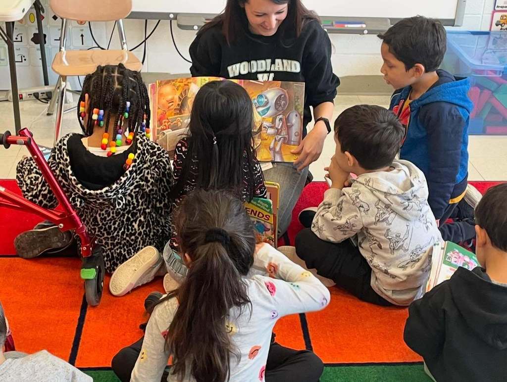 Mrs. Villalba's reading to her students