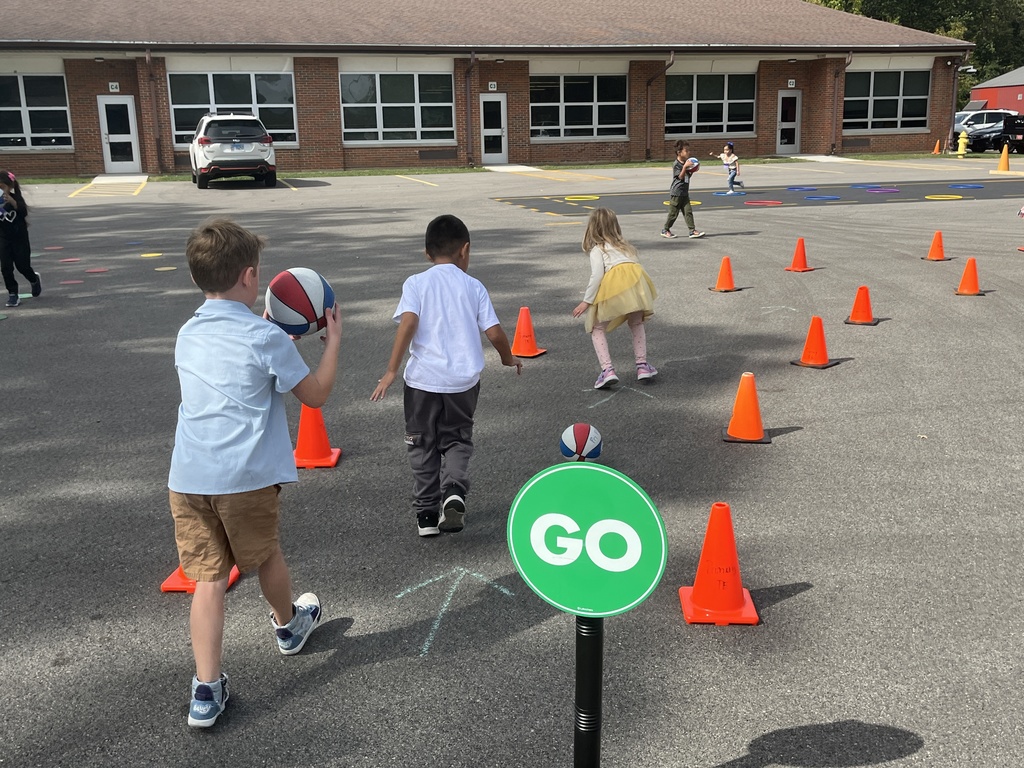 Basketball stations at outdoor P.E. at Woodland Primary