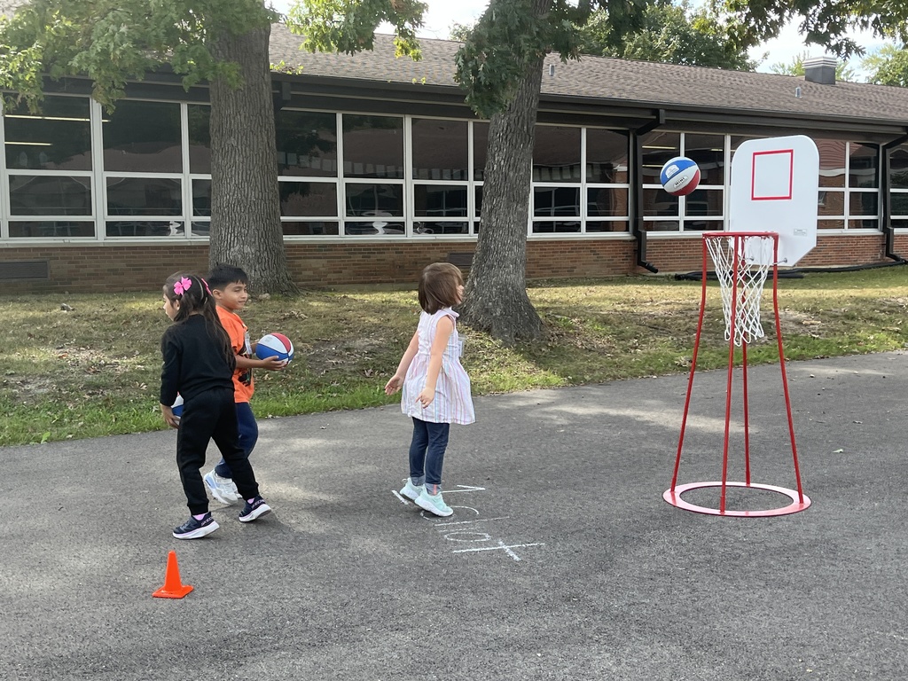 Basketball stations at outdoor P.E. at Woodland Primary
