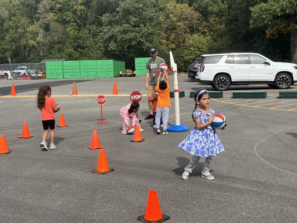 Basketball stations at outdoor P.E. at Woodland Primary